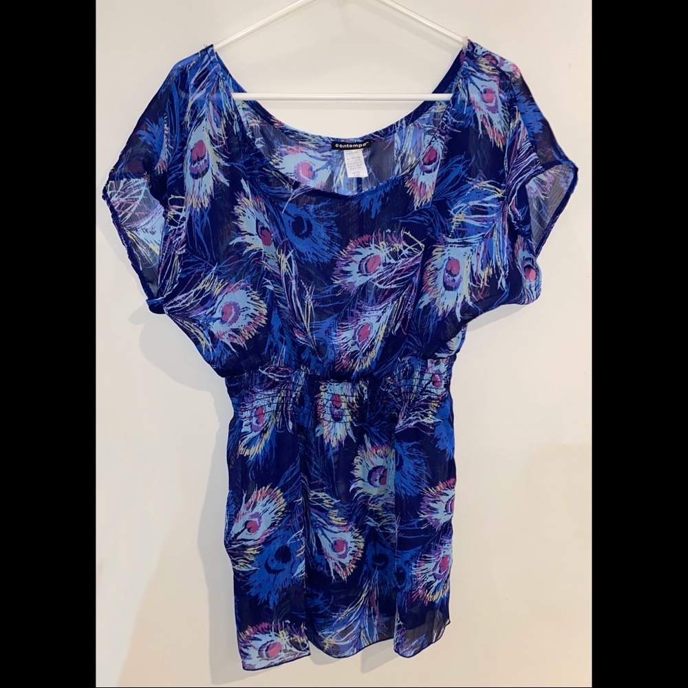 Peacock Feather Top the Clinches at Waist